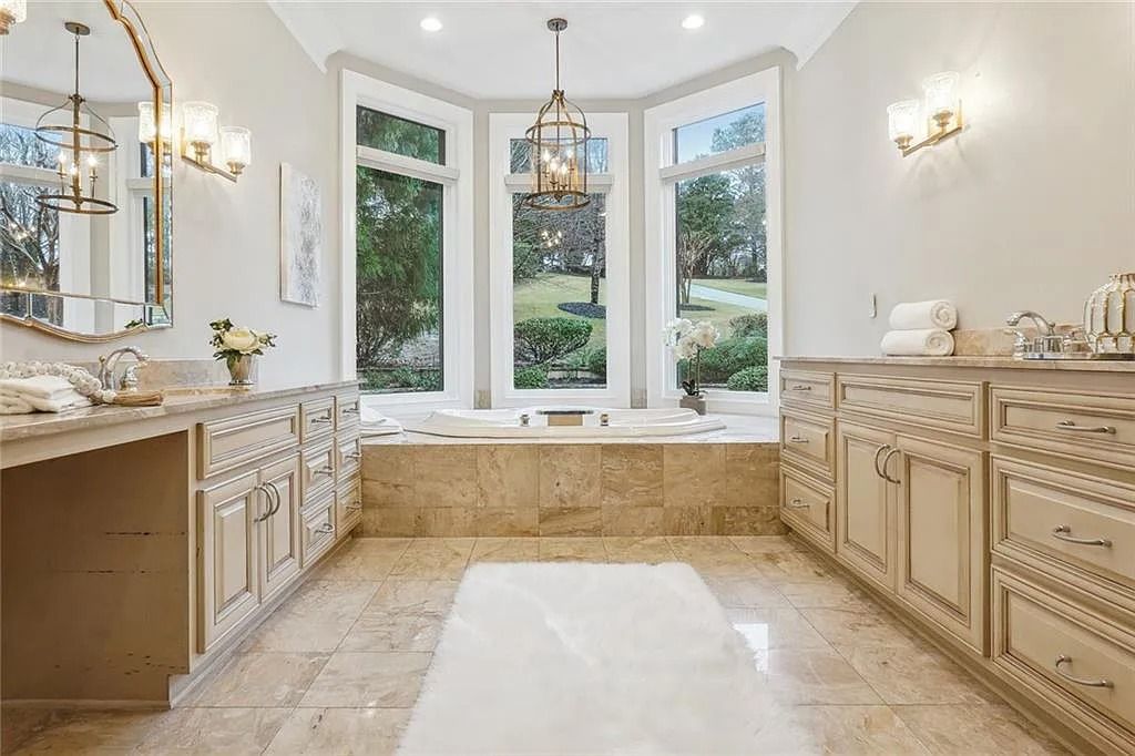 The Estate in Buford is a luxurious home offering the ultimate in privacy now available for sale. This home located at 6617 Garrett Rd, Buford, Georgia; offering 06 bedrooms and 07 bathrooms with 10,200 square feet of living spaces.