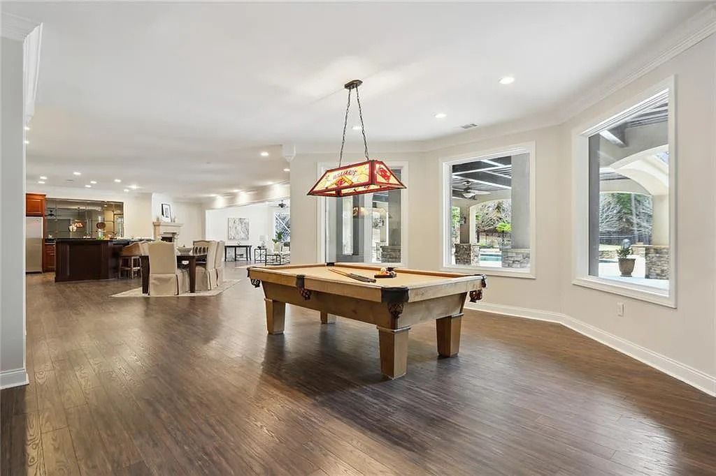 The Estate in Buford is a luxurious home offering the ultimate in privacy now available for sale. This home located at 6617 Garrett Rd, Buford, Georgia; offering 06 bedrooms and 07 bathrooms with 10,200 square feet of living spaces.