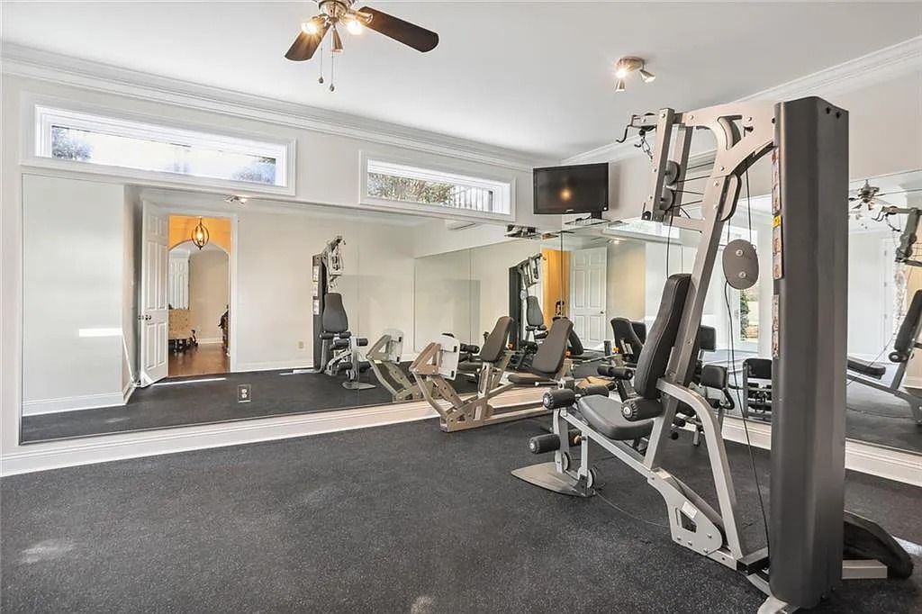 The Estate in Buford is a luxurious home offering the ultimate in privacy now available for sale. This home located at 6617 Garrett Rd, Buford, Georgia; offering 06 bedrooms and 07 bathrooms with 10,200 square feet of living spaces.