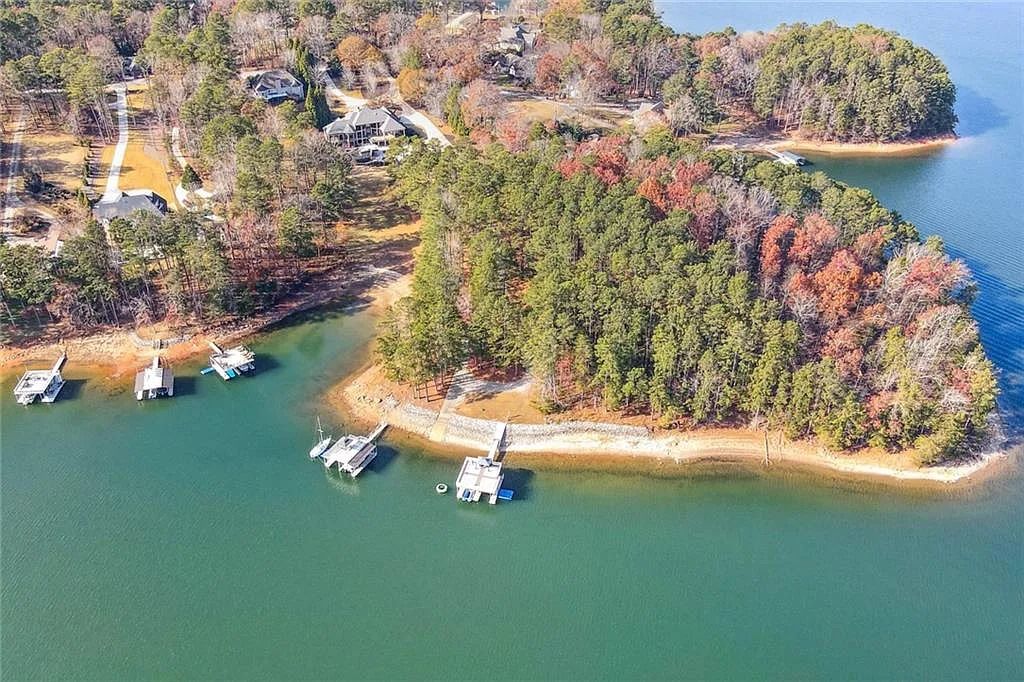 The Estate in Buford is a luxurious home offering the ultimate in privacy now available for sale. This home located at 6617 Garrett Rd, Buford, Georgia; offering 06 bedrooms and 07 bathrooms with 10,200 square feet of living spaces.