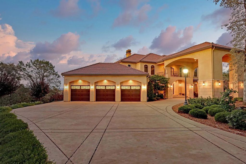 6890 Country Side Lane, Auburn, California is a magical property with fantastic theater, sports room, wine cellar, sparkling shared pond with dock, perfect spot for pool, private gated entry, tasteful landscape, equestrian trails.