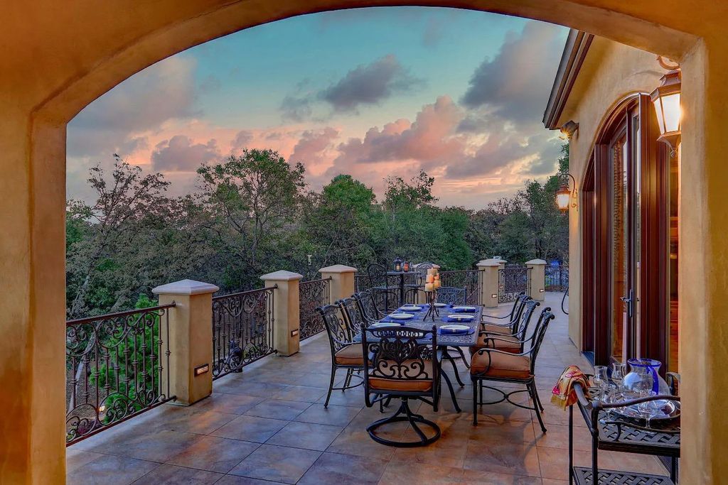 6890 Country Side Lane, Auburn, California is a magical property with fantastic theater, sports room, wine cellar, sparkling shared pond with dock, perfect spot for pool, private gated entry, tasteful landscape, equestrian trails.