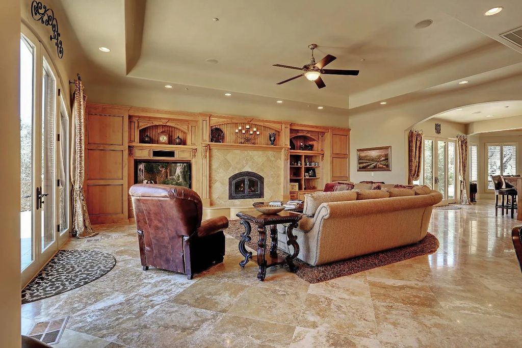 6890 Country Side Lane, Auburn, California is a magical property with fantastic theater, sports room, wine cellar, sparkling shared pond with dock, perfect spot for pool, private gated entry, tasteful landscape, equestrian trails.