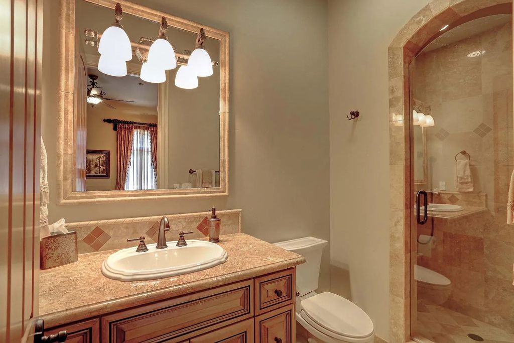 6890 Country Side Lane, Auburn, California is a magical property with fantastic theater, sports room, wine cellar, sparkling shared pond with dock, perfect spot for pool, private gated entry, tasteful landscape, equestrian trails.