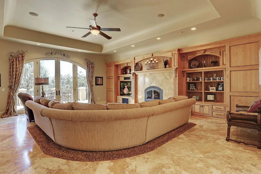 6890 Country Side Lane, Auburn, California is a magical property with fantastic theater, sports room, wine cellar, sparkling shared pond with dock, perfect spot for pool, private gated entry, tasteful landscape, equestrian trails.