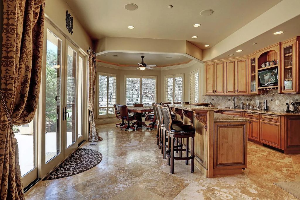 6890 Country Side Lane, Auburn, California is a magical property with fantastic theater, sports room, wine cellar, sparkling shared pond with dock, perfect spot for pool, private gated entry, tasteful landscape, equestrian trails.