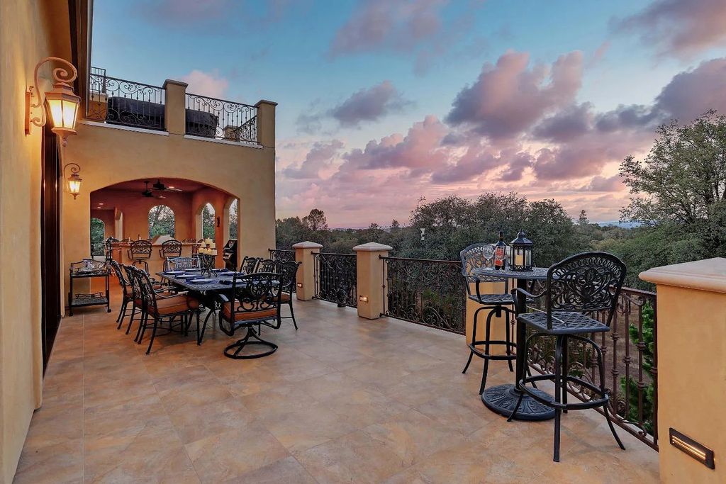 6890 Country Side Lane, Auburn, California is a magical property with fantastic theater, sports room, wine cellar, sparkling shared pond with dock, perfect spot for pool, private gated entry, tasteful landscape, equestrian trails.
