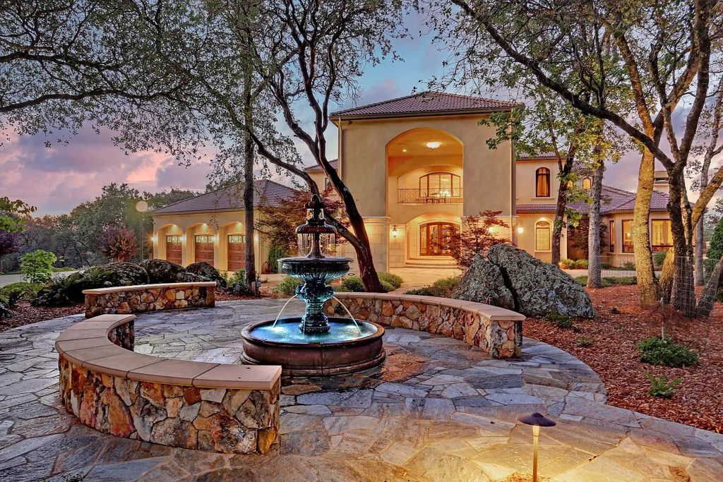 6890 Country Side Lane, Auburn, California is a magical property with fantastic theater, sports room, wine cellar, sparkling shared pond with dock, perfect spot for pool, private gated entry, tasteful landscape, equestrian trails.