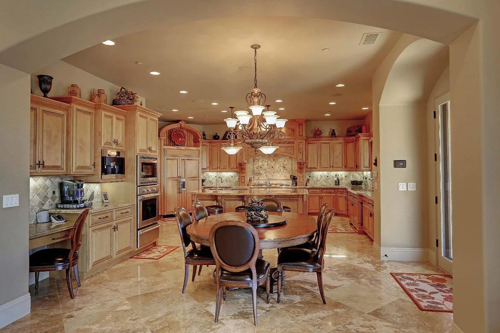 6890 Country Side Lane, Auburn, California is a magical property with fantastic theater, sports room, wine cellar, sparkling shared pond with dock, perfect spot for pool, private gated entry, tasteful landscape, equestrian trails.