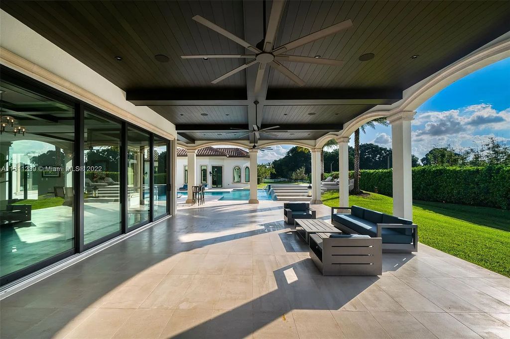5875 Stone Creek Way, Fort Lauderdale, Florida, built by acclaimed builder Rick Bell, sits on 5 acres and boasts over 20,000 square feet of space. This incredible and one-of-a-kind custom compound's grand estate, including private gates, features volume ceilings, a resort-style pool, and top-of-the-line appliances.
