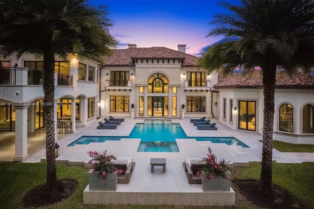 5875 Stone Creek Way, Fort Lauderdale, Florida, built by acclaimed builder Rick Bell, sits on 5 acres and boasts over 20,000 square feet of space. This incredible and one-of-a-kind custom compound's grand estate, including private gates, features volume ceilings, a resort-style pool, and top-of-the-line appliances.