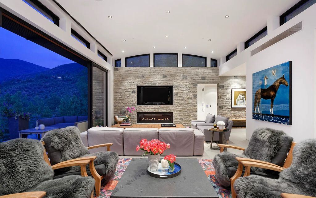 173 Skimming Lane, Aspen, Colorado is a chic contemporary home located less than one mile from Aspen's core providing the flexibility to be close to all of Aspen's amenities, yet private enough to enjoy the true meaning of quiet mountain living.