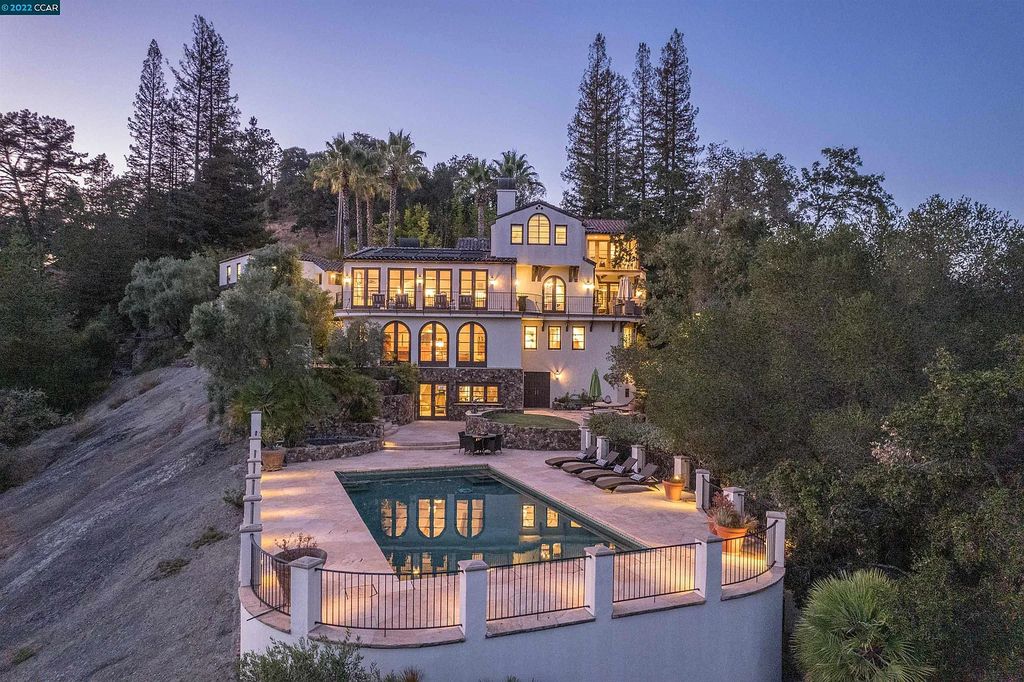 160 Camino Don Miguel, Orinda, California is a Spanish Revival estate originally constructed in 1929 sited on private gated grounds with breathtaking panoramic views, Mediterranean landscaping, offer a resort-like setting with direct access to the Orinda Country Club golf course.