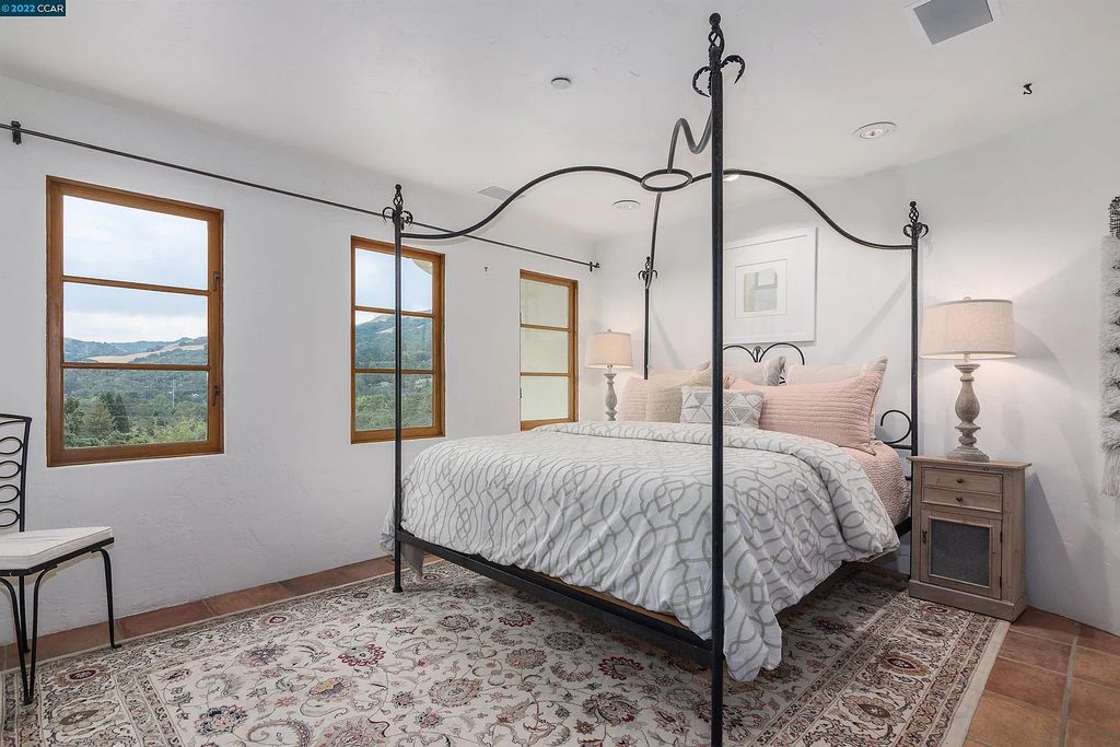 160 Camino Don Miguel, Orinda, California is a Spanish Revival estate originally constructed in 1929 sited on private gated grounds with breathtaking panoramic views, Mediterranean landscaping, offer a resort-like setting with direct access to the Orinda Country Club golf course.