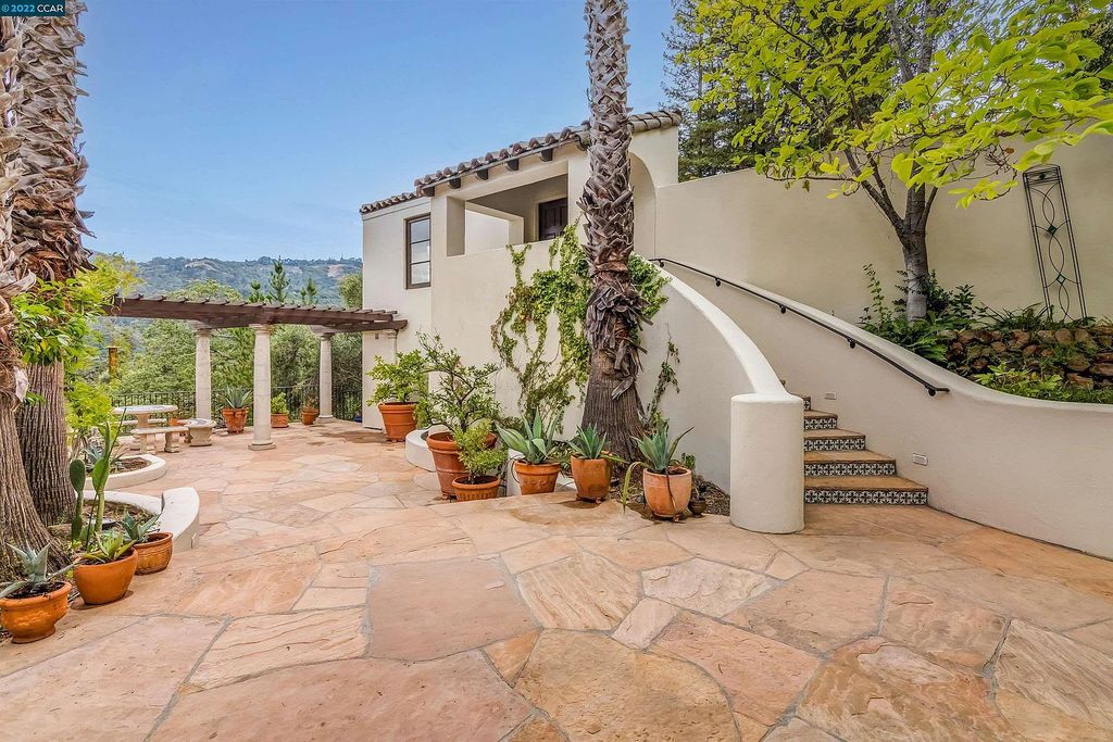160 Camino Don Miguel, Orinda, California is a Spanish Revival estate originally constructed in 1929 sited on private gated grounds with breathtaking panoramic views, Mediterranean landscaping, offer a resort-like setting with direct access to the Orinda Country Club golf course.