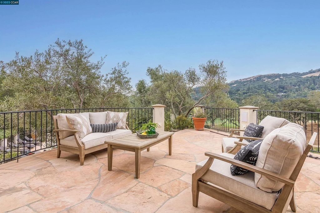 160 Camino Don Miguel, Orinda, California is a Spanish Revival estate originally constructed in 1929 sited on private gated grounds with breathtaking panoramic views, Mediterranean landscaping, offer a resort-like setting with direct access to the Orinda Country Club golf course.