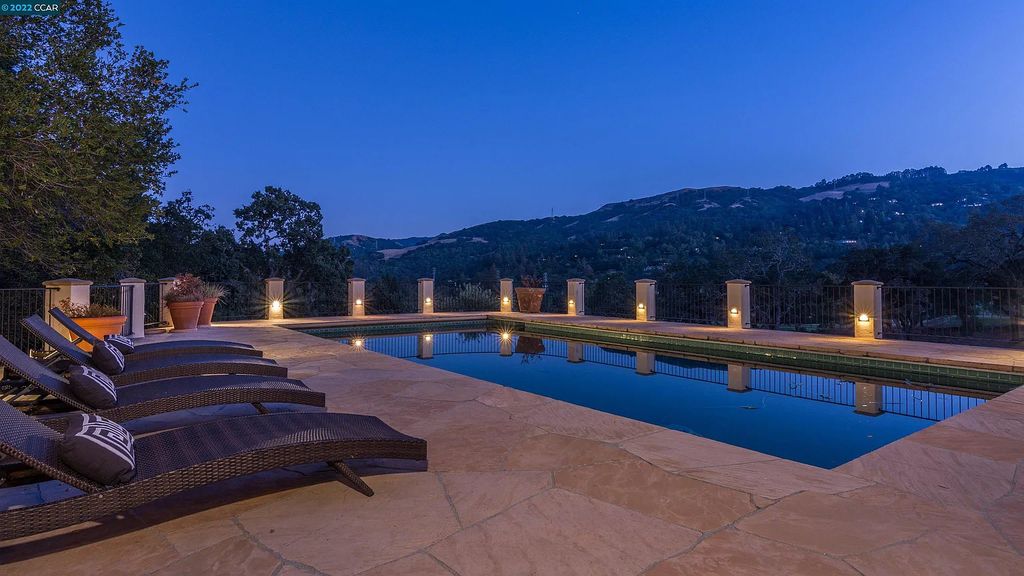 160 Camino Don Miguel, Orinda, California is a Spanish Revival estate originally constructed in 1929 sited on private gated grounds with breathtaking panoramic views, Mediterranean landscaping, offer a resort-like setting with direct access to the Orinda Country Club golf course.