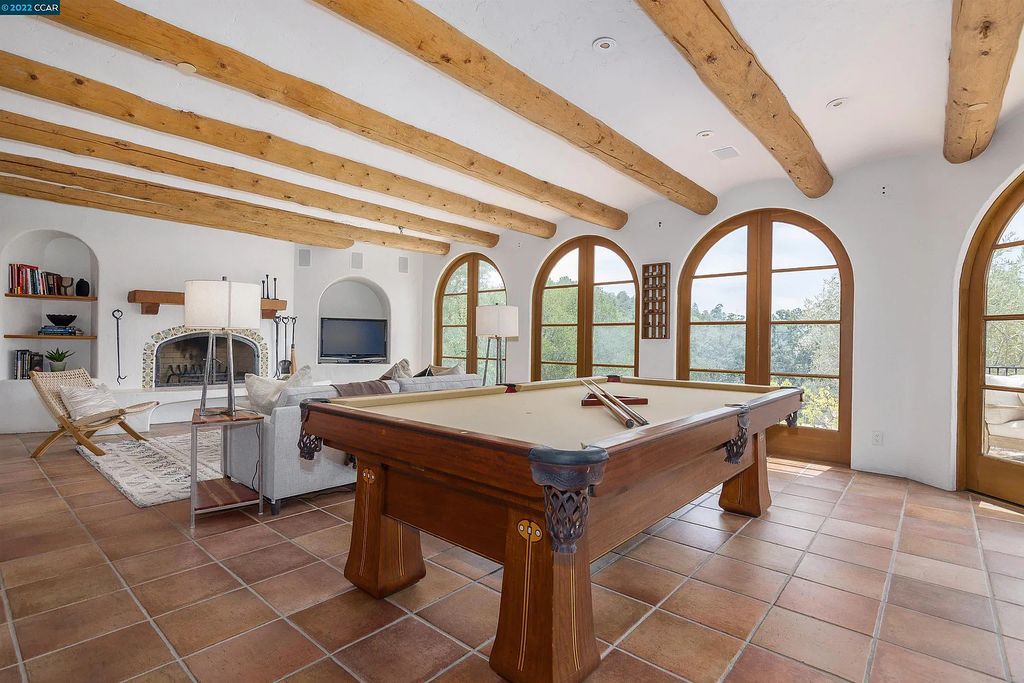 160 Camino Don Miguel, Orinda, California is a Spanish Revival estate originally constructed in 1929 sited on private gated grounds with breathtaking panoramic views, Mediterranean landscaping, offer a resort-like setting with direct access to the Orinda Country Club golf course.