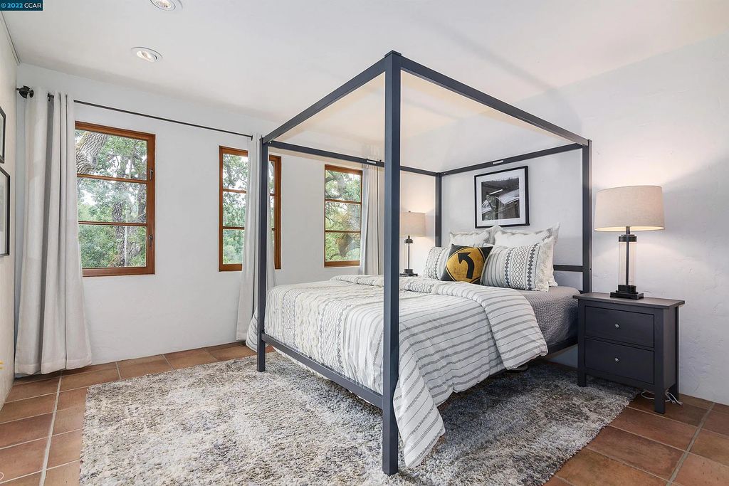 160 Camino Don Miguel, Orinda, California is a Spanish Revival estate originally constructed in 1929 sited on private gated grounds with breathtaking panoramic views, Mediterranean landscaping, offer a resort-like setting with direct access to the Orinda Country Club golf course.