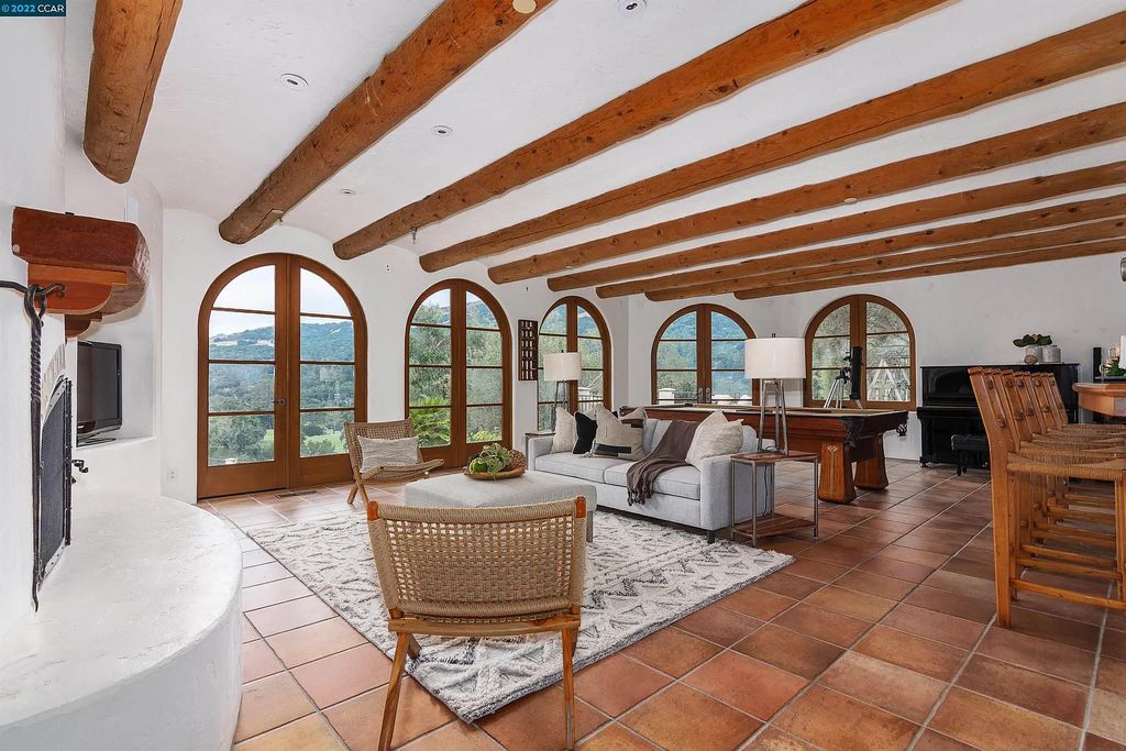 160 Camino Don Miguel, Orinda, California is a Spanish Revival estate originally constructed in 1929 sited on private gated grounds with breathtaking panoramic views, Mediterranean landscaping, offer a resort-like setting with direct access to the Orinda Country Club golf course.
