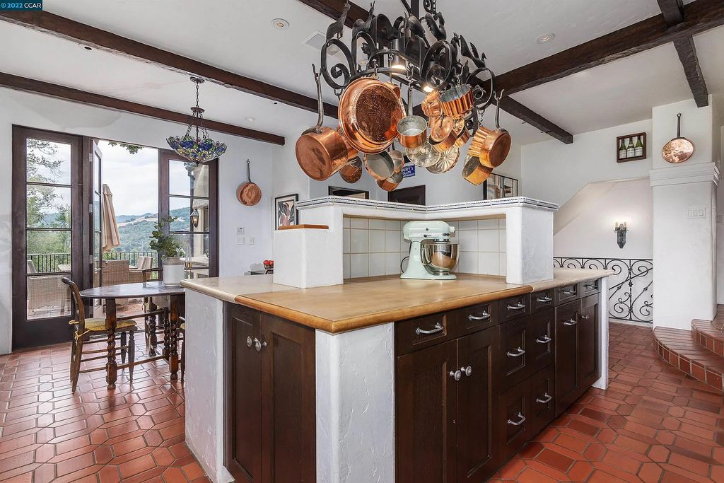 160 Camino Don Miguel, Orinda, California is a Spanish Revival estate originally constructed in 1929 sited on private gated grounds with breathtaking panoramic views, Mediterranean landscaping, offer a resort-like setting with direct access to the Orinda Country Club golf course.