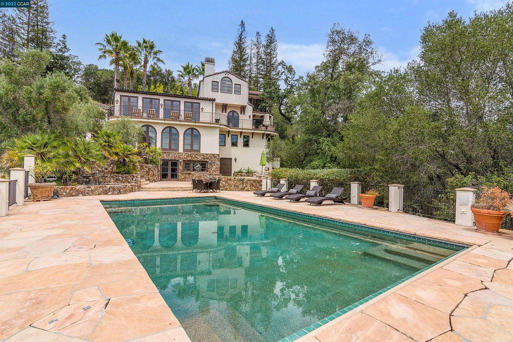 160 Camino Don Miguel, Orinda, California is a Spanish Revival estate originally constructed in 1929 sited on private gated grounds with breathtaking panoramic views, Mediterranean landscaping, offer a resort-like setting with direct access to the Orinda Country Club golf course.
