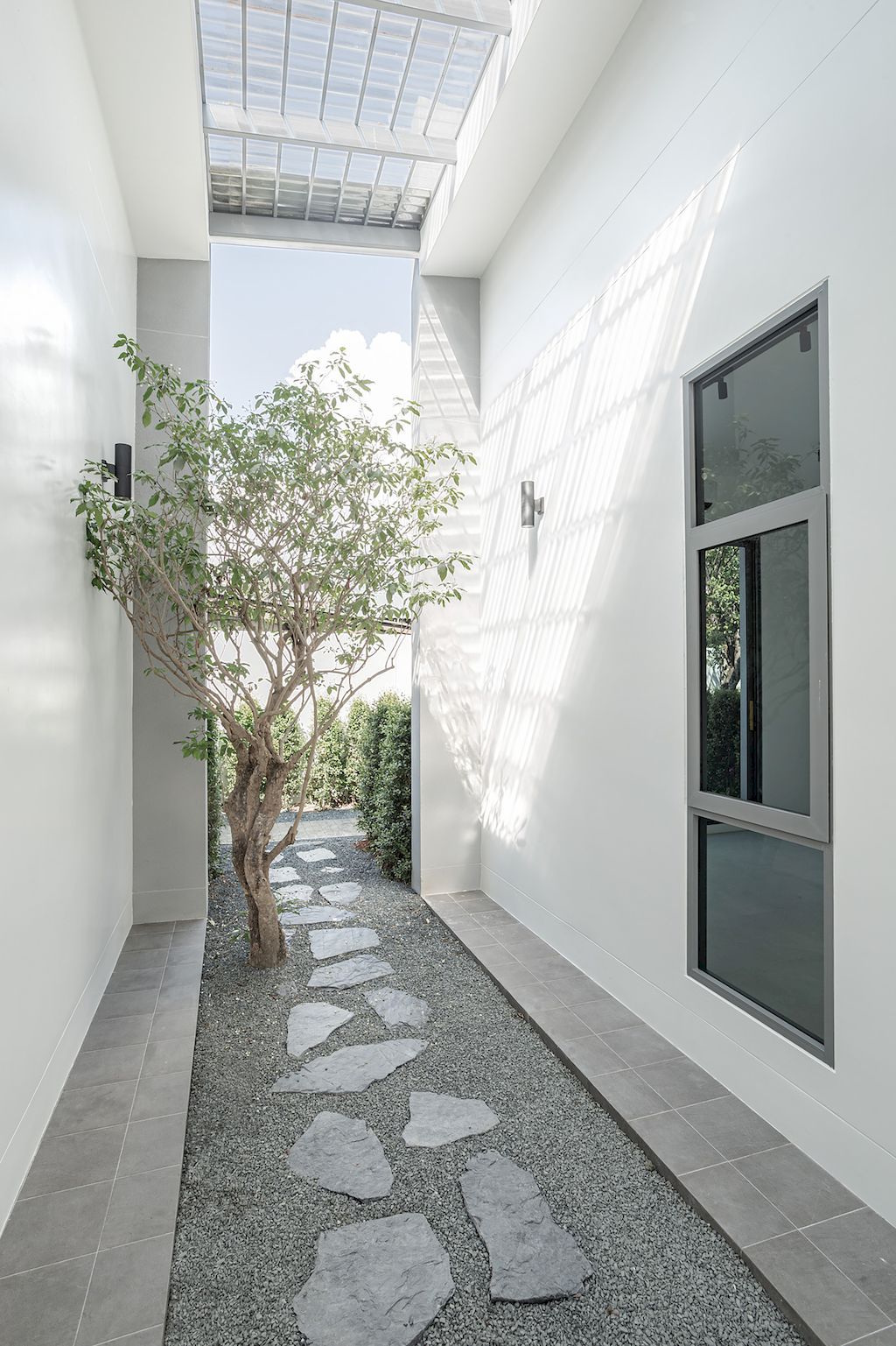 TP House with Private, Serene and Greenery Spaces by 2929 Design Lab