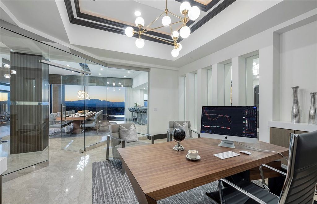 15 Yorkridge Court, Henderson, Nevada is a modern custom in guard gated Anthem Country Club remodeled in 2022 with open indoor outdoor concept, dramatic architecture, gorgeous finishes. 