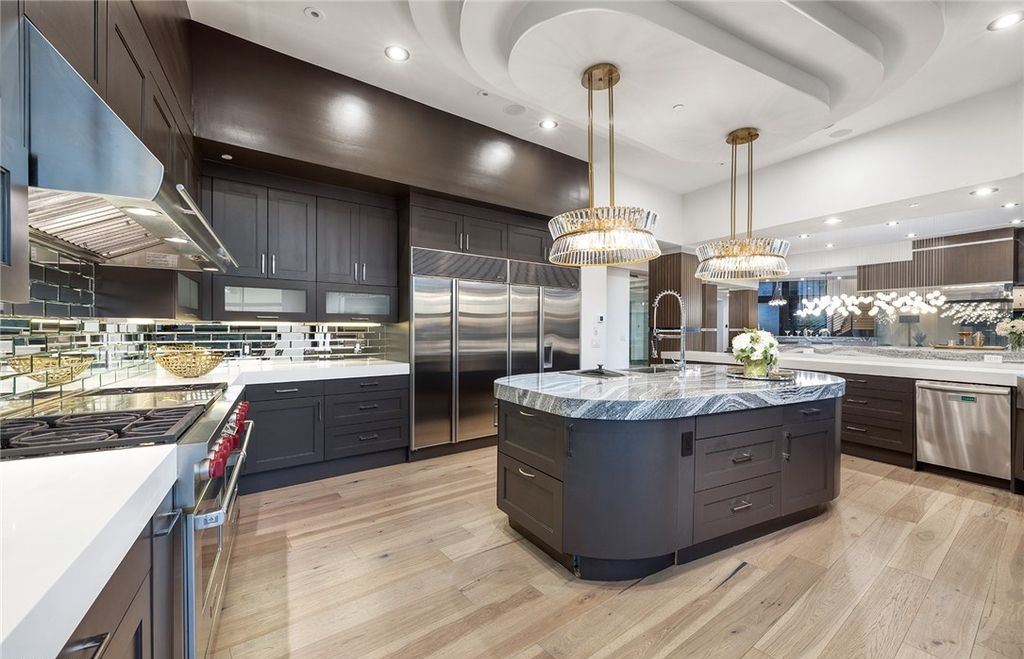 15 Yorkridge Court, Henderson, Nevada is a modern custom in guard gated Anthem Country Club remodeled in 2022 with open indoor outdoor concept, dramatic architecture, gorgeous finishes. 