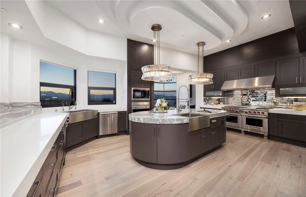 15 Yorkridge Court, Henderson, Nevada is a modern custom in guard gated Anthem Country Club remodeled in 2022 with open indoor outdoor concept, dramatic architecture, gorgeous finishes. 