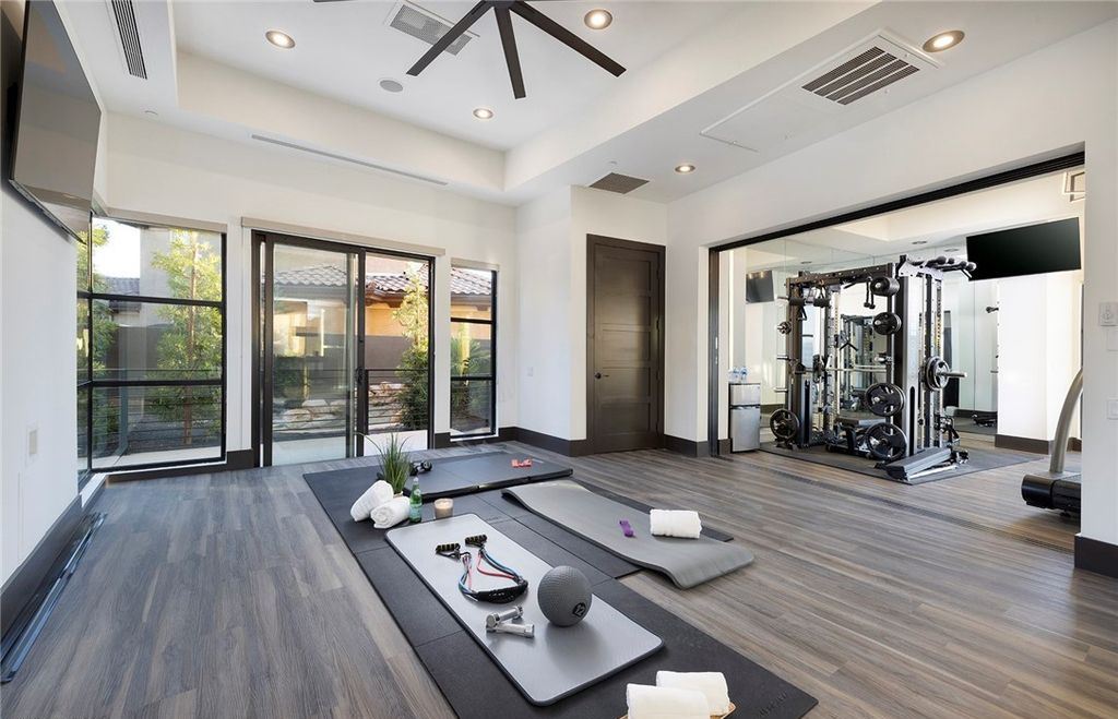 15 Yorkridge Court, Henderson, Nevada is a modern custom in guard gated Anthem Country Club remodeled in 2022 with open indoor outdoor concept, dramatic architecture, gorgeous finishes. 