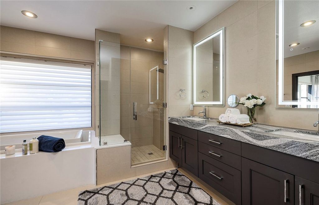 15 Yorkridge Court, Henderson, Nevada is a modern custom in guard gated Anthem Country Club remodeled in 2022 with open indoor outdoor concept, dramatic architecture, gorgeous finishes. 