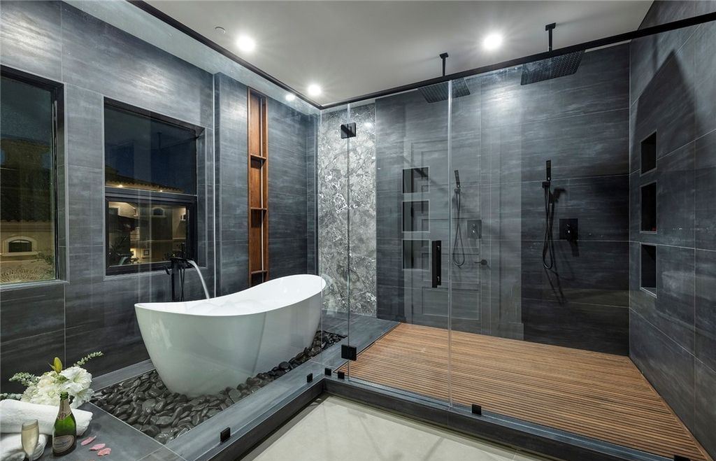 15 Yorkridge Court, Henderson, Nevada is a modern custom in guard gated Anthem Country Club remodeled in 2022 with open indoor outdoor concept, dramatic architecture, gorgeous finishes. 