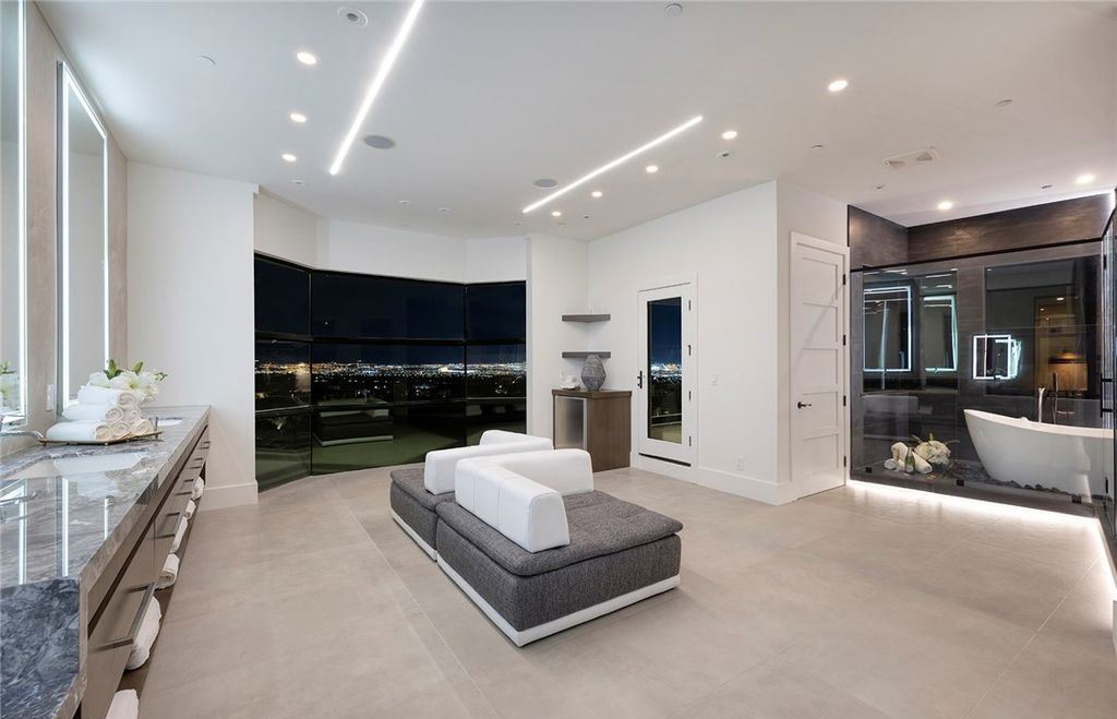 15 Yorkridge Court, Henderson, Nevada is a modern custom in guard gated Anthem Country Club remodeled in 2022 with open indoor outdoor concept, dramatic architecture, gorgeous finishes. 