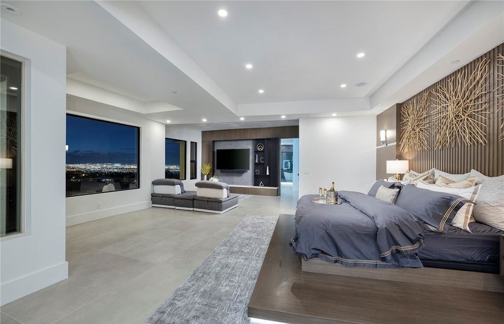 15 Yorkridge Court, Henderson, Nevada is a modern custom in guard gated Anthem Country Club remodeled in 2022 with open indoor outdoor concept, dramatic architecture, gorgeous finishes. 