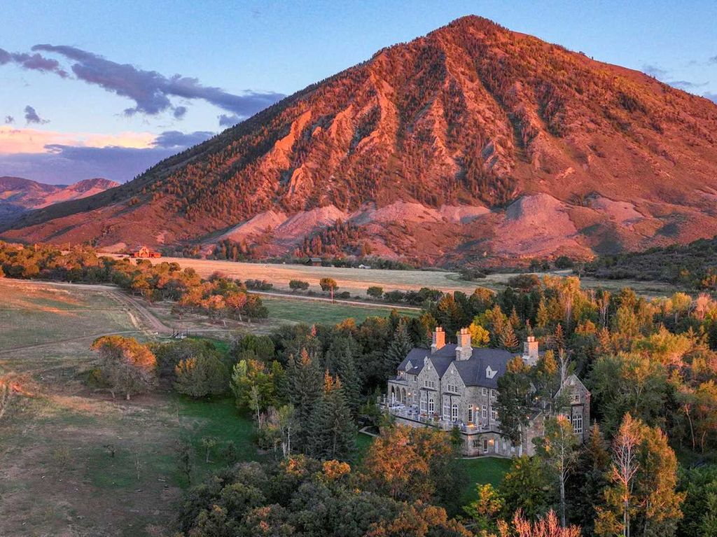 43409 Cottonwood Creek Road, Crawford, Colorado is an inspired English estate nestled in the heart of the North Fork Valley in Southwestern Colorado enjoys unmatched peace and privacy as well as stunning vistas of Needle Rock, Landsend Peak, and the surrounding West Elk Mountains.