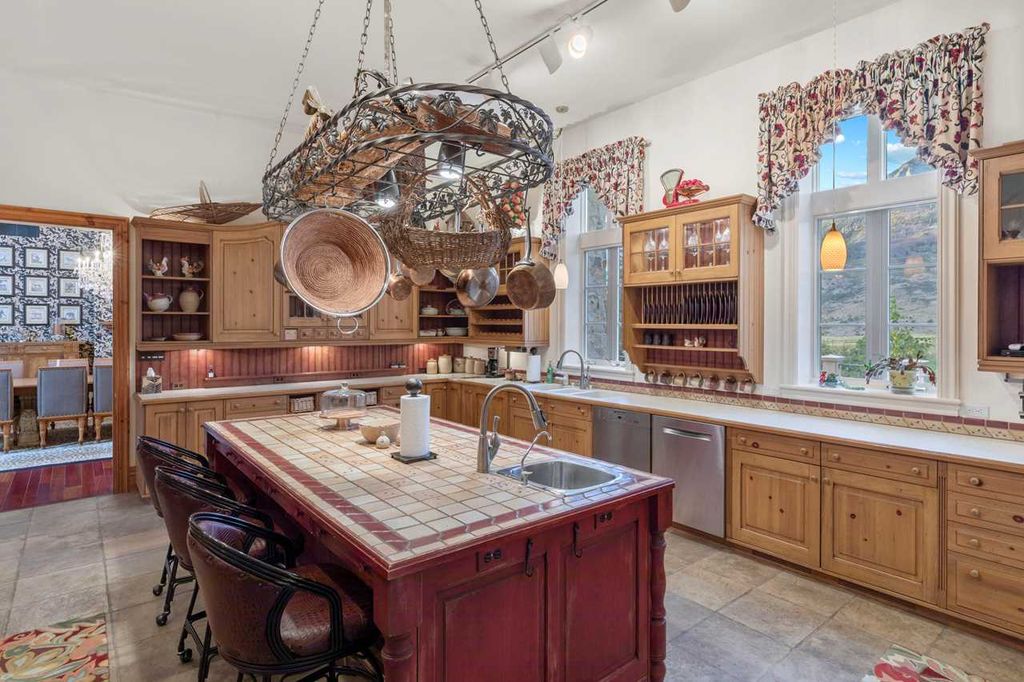 43409 Cottonwood Creek Road, Crawford, Colorado is an inspired English estate nestled in the heart of the North Fork Valley in Southwestern Colorado enjoys unmatched peace and privacy as well as stunning vistas of Needle Rock, Landsend Peak, and the surrounding West Elk Mountains.