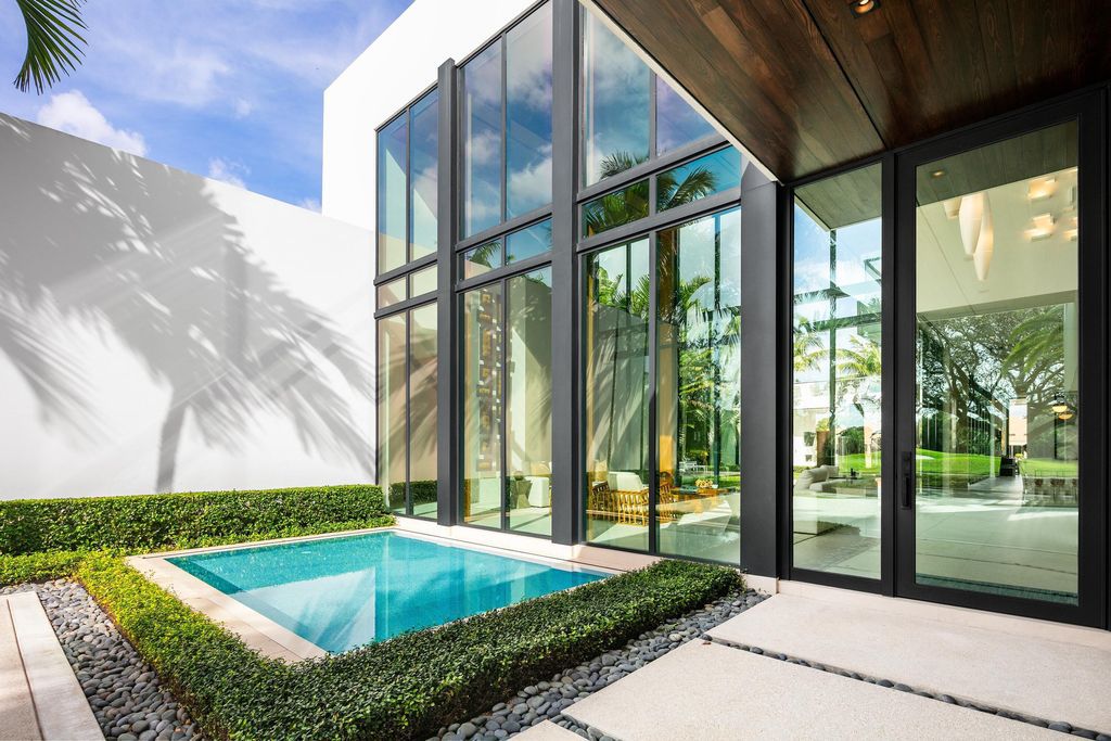 160 Spyglass Lane, Jupiter, Florida, stands out among the elegance of Jupiter’s coveted Admiral’s Cove, with intricate stone and wood finishes. A summer kitchen and 100 feet of pristine beach on the outside, with views of the Intracoastal Waterway, make this a truly delightful location.
