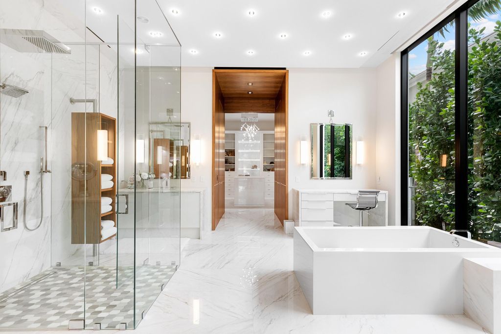 160 Spyglass Lane, Jupiter, Florida, stands out among the elegance of Jupiter’s coveted Admiral’s Cove, with intricate stone and wood finishes. A summer kitchen and 100 feet of pristine beach on the outside, with views of the Intracoastal Waterway, make this a truly delightful location.