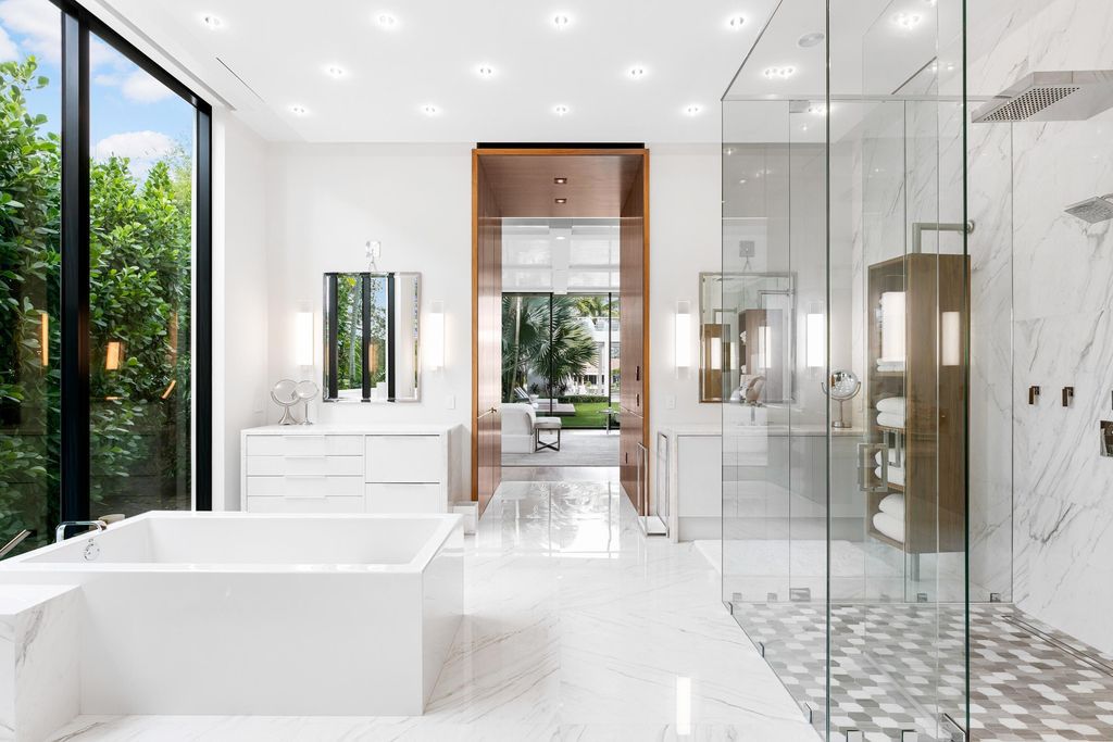 160 Spyglass Lane, Jupiter, Florida, stands out among the elegance of Jupiter’s coveted Admiral’s Cove, with intricate stone and wood finishes. A summer kitchen and 100 feet of pristine beach on the outside, with views of the Intracoastal Waterway, make this a truly delightful location.