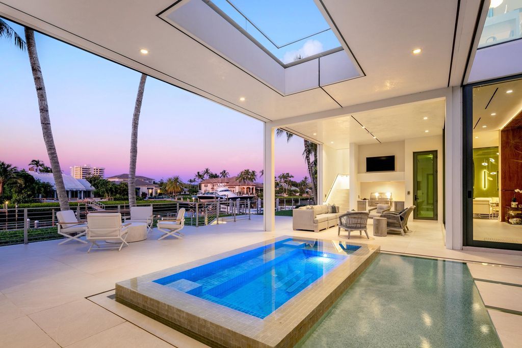 160 Spyglass Lane, Jupiter, Florida, stands out among the elegance of Jupiter’s coveted Admiral’s Cove, with intricate stone and wood finishes. A summer kitchen and 100 feet of pristine beach on the outside, with views of the Intracoastal Waterway, make this a truly delightful location.