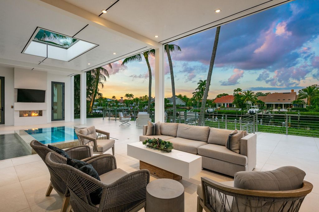 160 Spyglass Lane, Jupiter, Florida, stands out among the elegance of Jupiter’s coveted Admiral’s Cove, with intricate stone and wood finishes. A summer kitchen and 100 feet of pristine beach on the outside, with views of the Intracoastal Waterway, make this a truly delightful location.