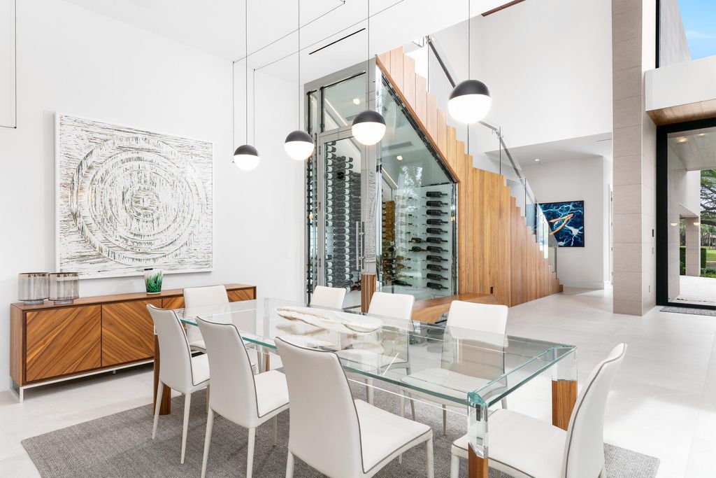 160 Spyglass Lane, Jupiter, Florida, stands out among the elegance of Jupiter’s coveted Admiral’s Cove, with intricate stone and wood finishes. A summer kitchen and 100 feet of pristine beach on the outside, with views of the Intracoastal Waterway, make this a truly delightful location.