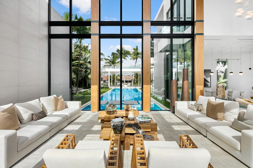 160 Spyglass Lane, Jupiter, Florida, stands out among the elegance of Jupiter’s coveted Admiral’s Cove, with intricate stone and wood finishes. A summer kitchen and 100 feet of pristine beach on the outside, with views of the Intracoastal Waterway, make this a truly delightful location.