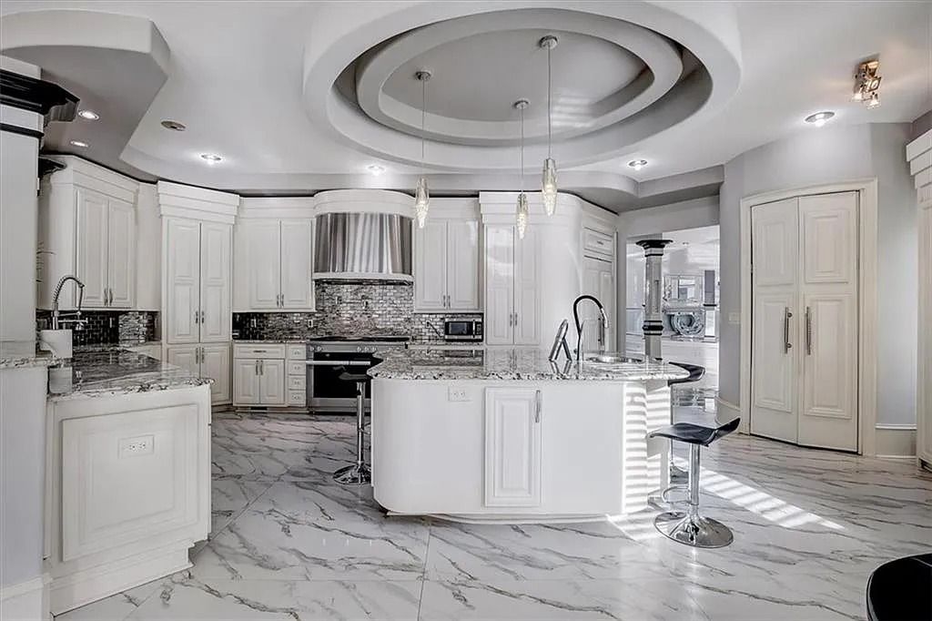 The Estate in Stone Mountain is a luxurious home where beautiful flow and natural light are awe-inspiring now available for sale. This home located at 3125 Juhan Rd, Stone Mountain, Georgia; offering 08 bedrooms and 09 bathrooms with 15,906 square feet of living spaces. 