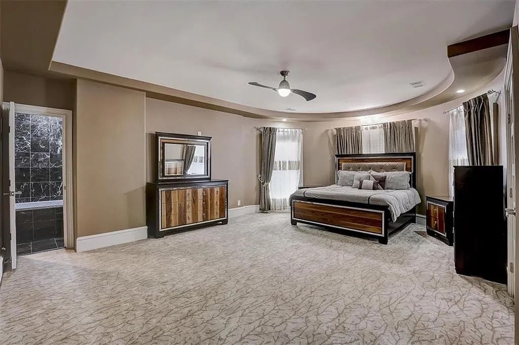 The Estate in Stone Mountain is a luxurious home where beautiful flow and natural light are awe-inspiring now available for sale. This home located at 3125 Juhan Rd, Stone Mountain, Georgia; offering 08 bedrooms and 09 bathrooms with 15,906 square feet of living spaces. 