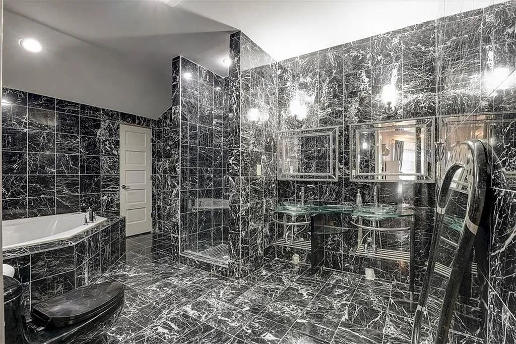 The Estate in Stone Mountain is a luxurious home where beautiful flow and natural light are awe-inspiring now available for sale. This home located at 3125 Juhan Rd, Stone Mountain, Georgia; offering 08 bedrooms and 09 bathrooms with 15,906 square feet of living spaces. 