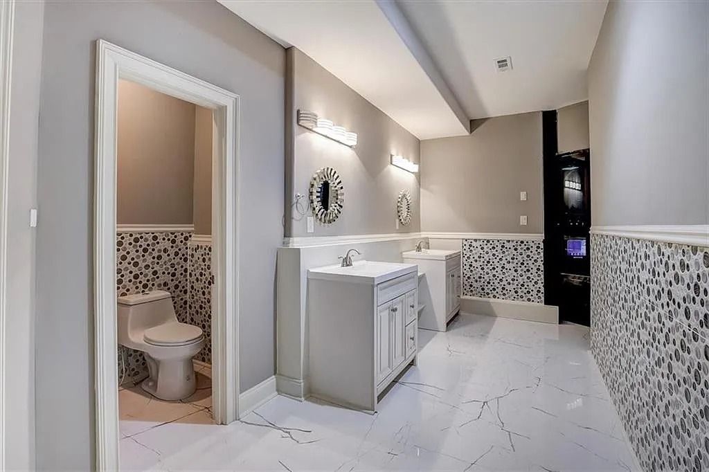 The Estate in Stone Mountain is a luxurious home where beautiful flow and natural light are awe-inspiring now available for sale. This home located at 3125 Juhan Rd, Stone Mountain, Georgia; offering 08 bedrooms and 09 bathrooms with 15,906 square feet of living spaces. 