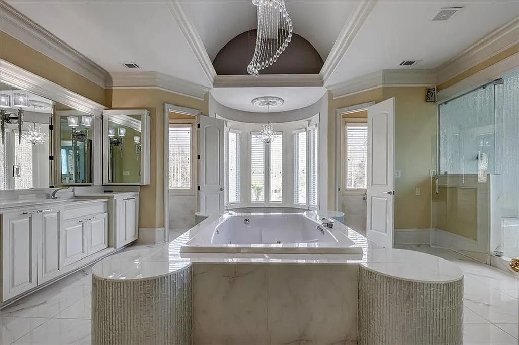 The Estate in Stone Mountain is a luxurious home where beautiful flow and natural light are awe-inspiring now available for sale. This home located at 3125 Juhan Rd, Stone Mountain, Georgia; offering 08 bedrooms and 09 bathrooms with 15,906 square feet of living spaces. 