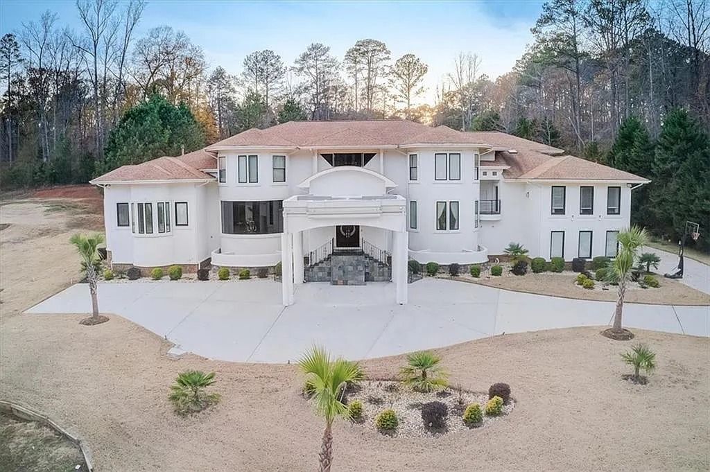 The Estate in Stone Mountain is a luxurious home where beautiful flow and natural light are awe-inspiring now available for sale. This home located at 3125 Juhan Rd, Stone Mountain, Georgia; offering 08 bedrooms and 09 bathrooms with 15,906 square feet of living spaces. 
